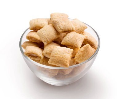 Cam kase üzerinde beyaz izole yastık dolu