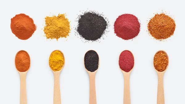 Collage of different seasoning in wooden spoon — Stock Photo, Image