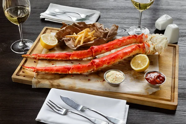 Romantic dinner with king crab legs in restaurant