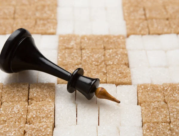 Chess board made of white and brown sugar with King — Stock Photo, Image