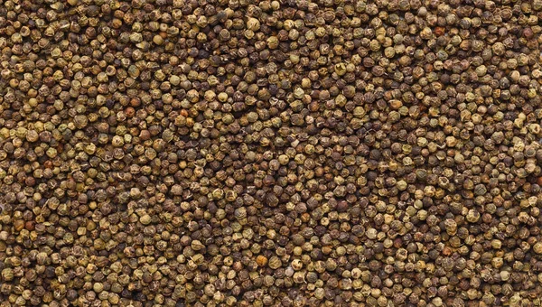 Peppercorns, closeup, top view — Stock Photo, Image