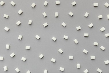 Rafine şeker minimalist desen gri arka plan üzerinde
