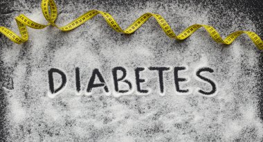 Diyabet kelime beyaz dağınık şeker yazılmış