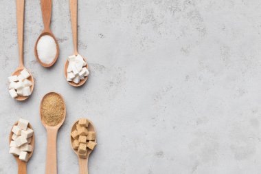 Şeker gri arka plan üzerinde farklı türde topluluğu