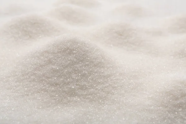 Textura de açúcar branco, fundo doce com espaço de cópia — Fotografia de Stock