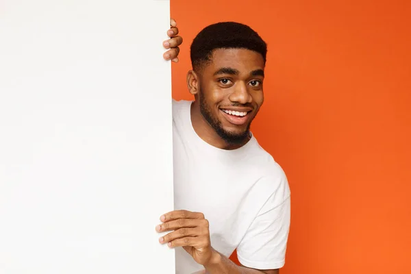 Young African American Man Looking Out White Blank Placard Ready — Stock Fotó