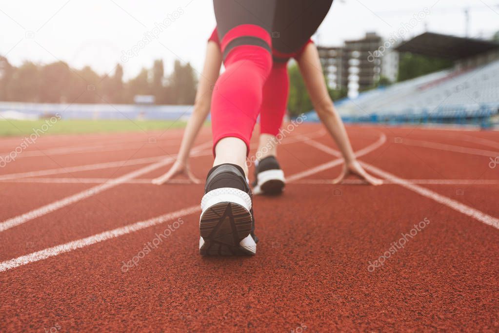 Girl on starting position at the stadium