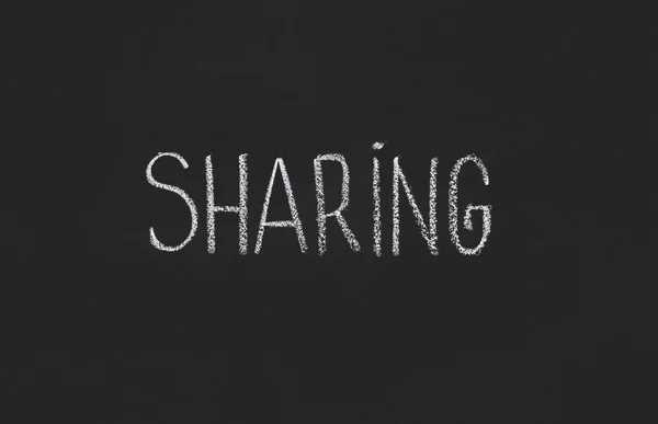 Word Sharing escrito en pizarra negra, espacio para copiar — Foto de Stock