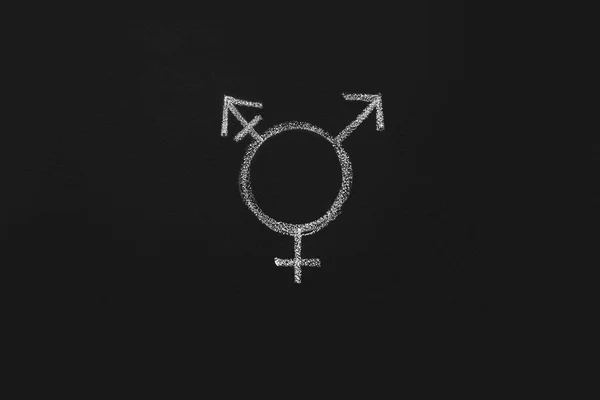 Трансгендерный символ, нарисованный на фоне черной доски — стоковое фото