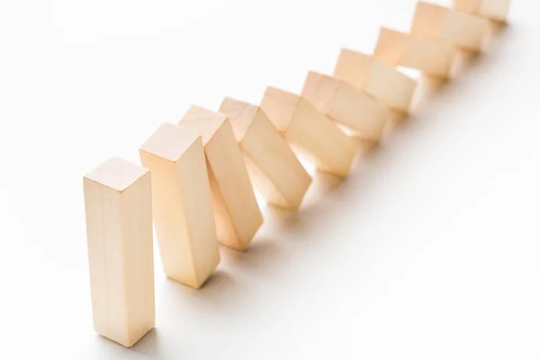 Domino effect stopped by one strong piece — Stock Photo, Image