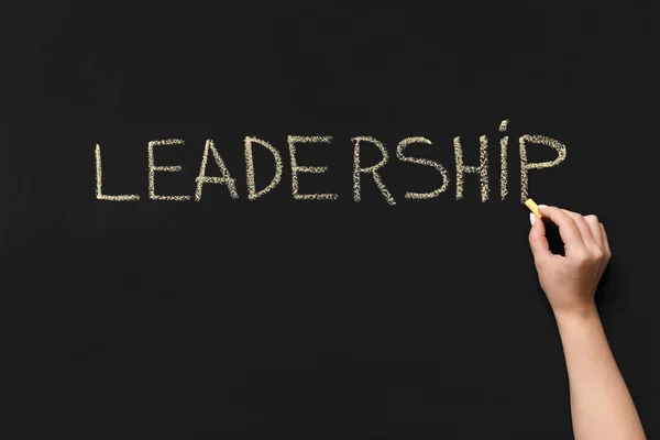 Word Leadership written with white chalk on blackboard — Stock Photo, Image