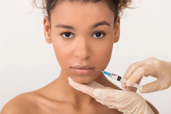 Lip augmentation. Woman getting lips injection in salon — Stock Photo, Image