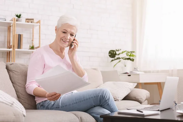 Ambitious elderly lady managing project from home — Stock Photo, Image