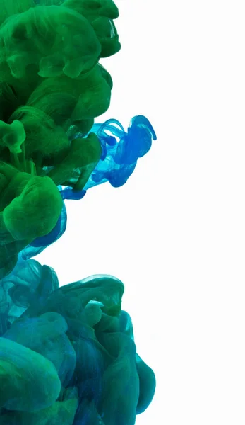 Tinta de mezcla verde y azul en agua — Foto de Stock