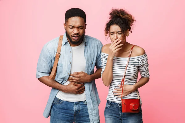 Food poisoning. Tourists having stomach ache during journey — Stock Photo, Image