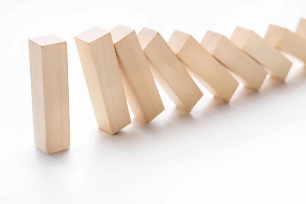 Domino effect stopped by one strong piece — Stock Photo, Image