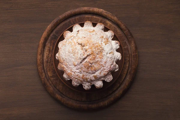 Easter yeast cake on wooden table — Stock Photo, Image