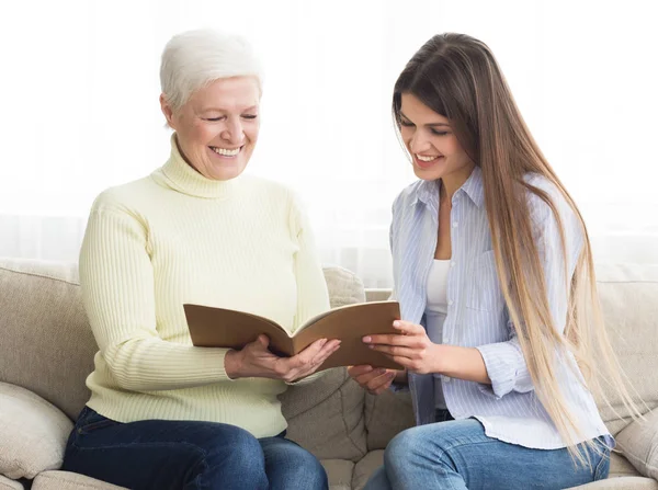 Financial consultant presenting bank investments to senior woman