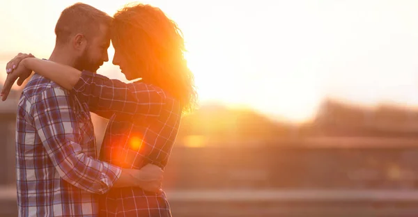 Touch of love. Serene couple touching foreheads