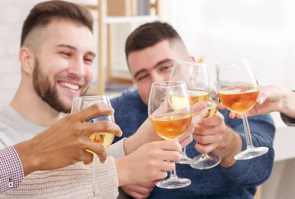 Celebrate meeting. Friends clinking wine glasses at home — Stock Photo, Image
