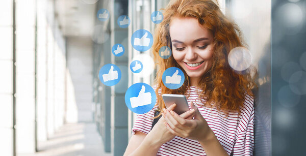 Young woman using social media on smartphone