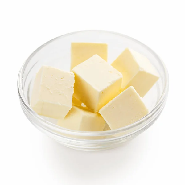Butterwürfel in Schüssel — Stockfoto