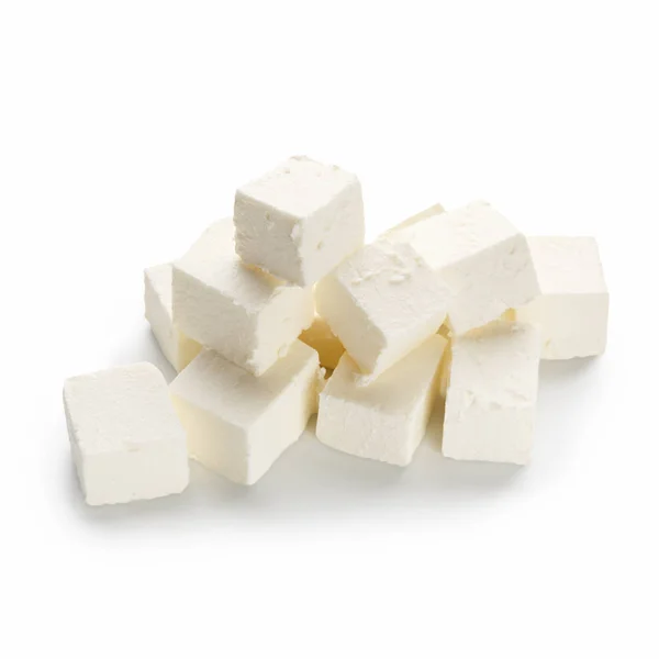 Kostičky sýra feta na bílém — Stock fotografie