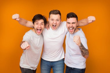 Yes. Cheerful men shouting and celebrating victory