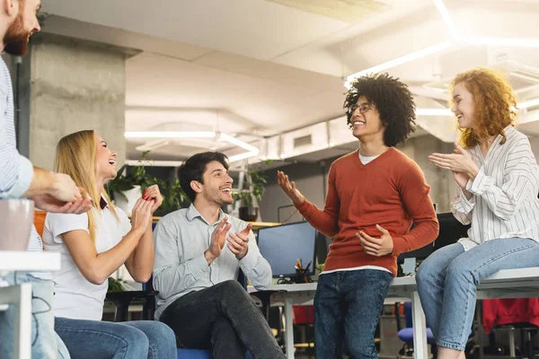 Creative team enjoying communication in modern office — Stock Photo, Image