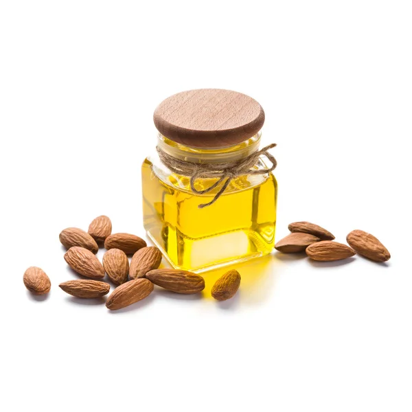 Bottle of almond oil on white — Stock Photo, Image