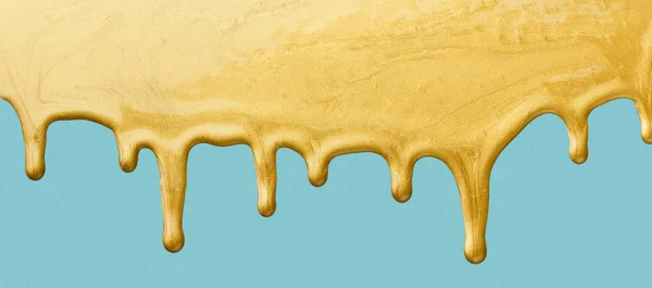 Golden paint dripping — Stock Photo, Image