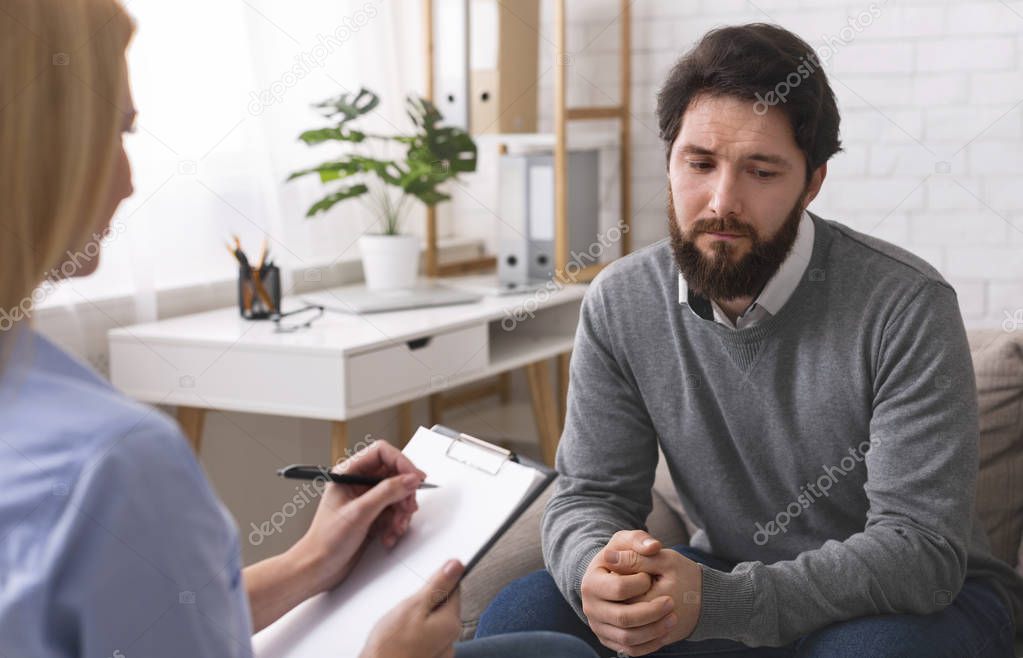 Lonely man realizing his problems, getting psychological help
