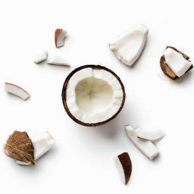 Pieces of coconut on white clipart