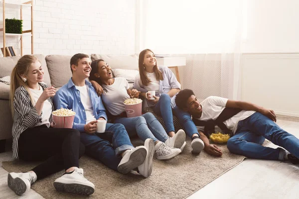 Comedy film. Happy friends watching movie at home — Stock Photo, Image