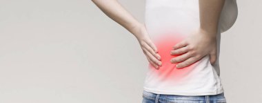 Kidney inflammation, woman suffering from acute backache