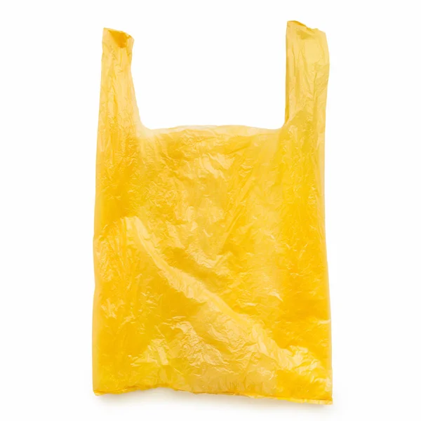 Bolsa de plástico amarillo sobre blanco — Foto de Stock