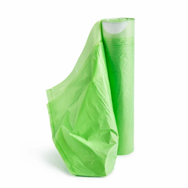 Sacchetti di immondizia verde su sfondo bianco — Foto Stock