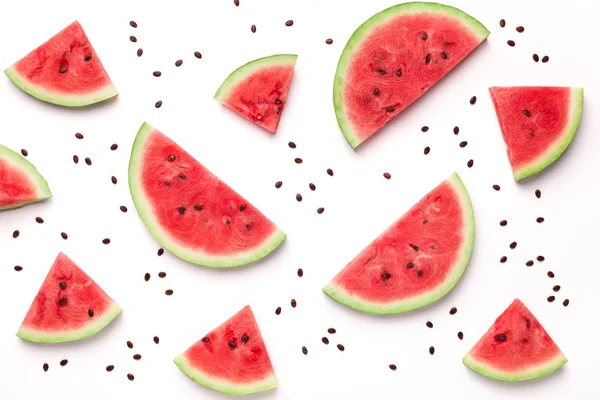 Sliced watermelon and seeds on white background — Stock Photo, Image