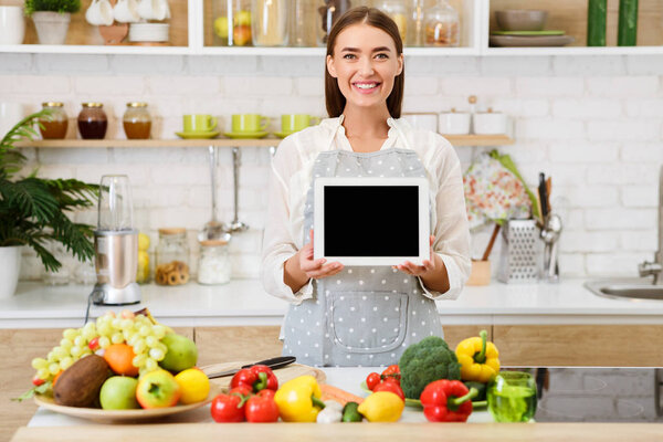 Healthy Food Concept. Woman Holding Tablet With Blank Screen