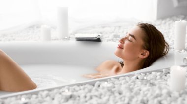 Wellness And Relax Concept. Woman Resting In Bath clipart