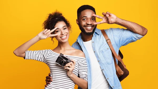 Young Couple Ready For Trip, Orange Background — 스톡 사진