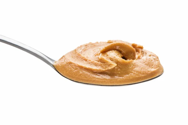 Ложка арахисового масла — стоковое фото