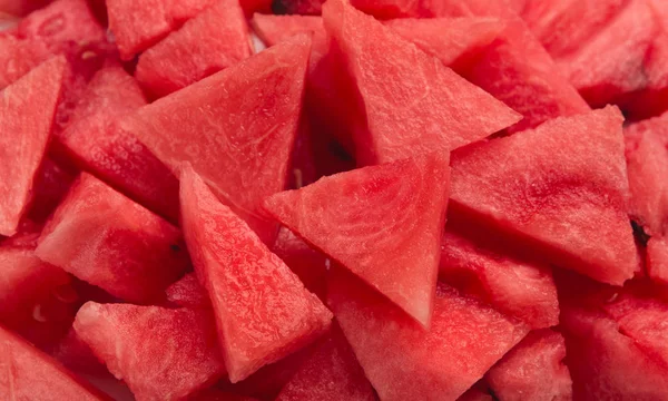 Red seedless watermelon pieces variety, summer food background — Stock Photo, Image