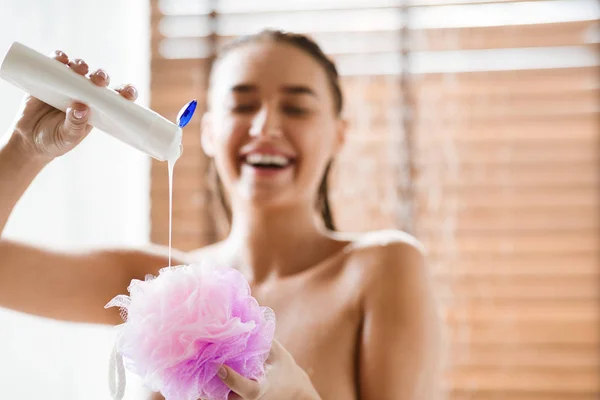 Hygiene Concept. Girl Putting Shower Gel On Puff