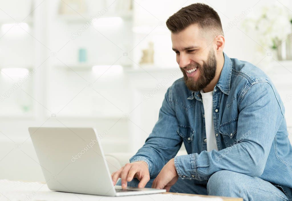 Freelancer Man Working On Laptop Online At Home