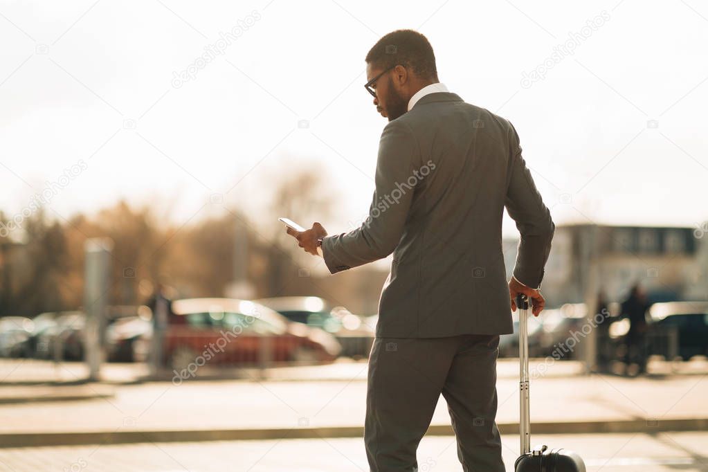 Businessman Ordering Taxi, Using Mobile Phone App