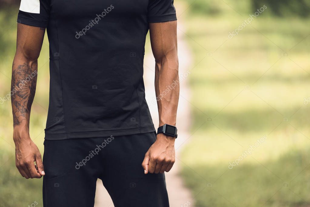 Afro Man In Blank T-Shirt Standing Outdoors, Empty Space For Your Text