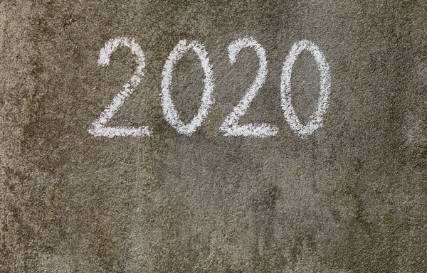 Chalk text 2020 on the grey wall outdoor — Stock Photo, Image