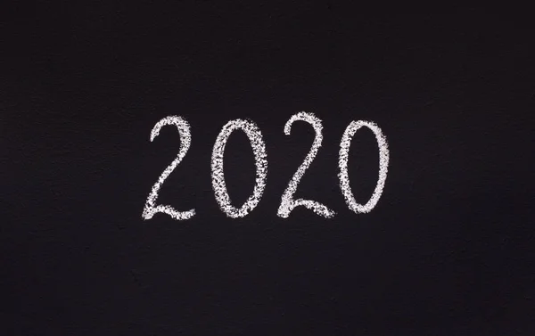 Ecriture concept craie blanche 2020 sur tableau noir — Photo