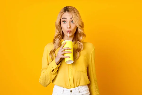 Surprised Woman Drinking Juice From Plastic Cup — Stock Photo, Image
